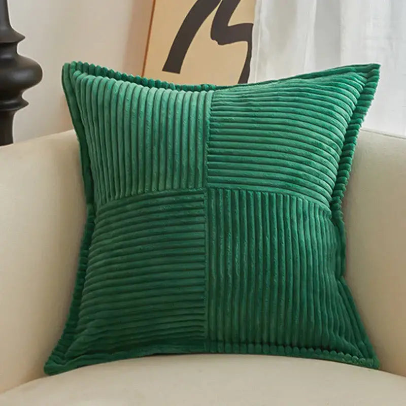 Emerald green corduroy pillow cover with quilted patchwork boho striped design for living room decor