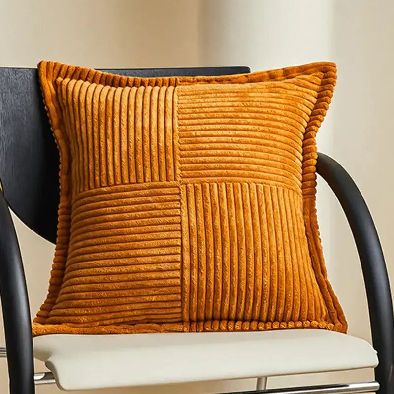 Warm orange corduroy throw pillow with patchwork ribbed design ideal for boho striped pillow and striped pillow covers
