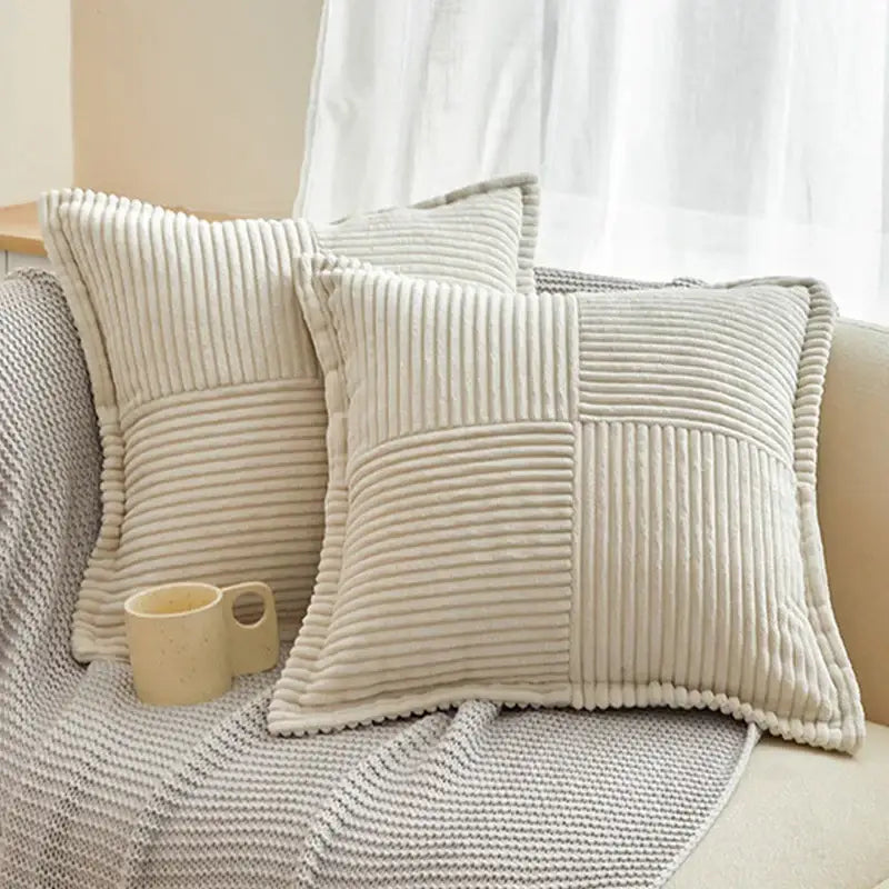 Cream-colored corduroy pillow covers with quilted patchwork design for boho striped pillow living room decor
