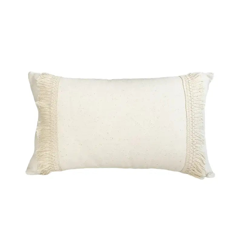 Cream-colored boho style cushion cover with textured linen fabric and decorative fringed edges for decorbites boho style decor
