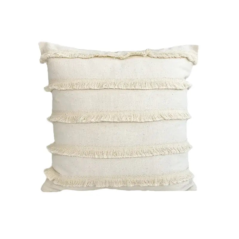Cream-colored boho style linen cushion cover with horizontal frayed stripes and tassels for living room decorbites decor