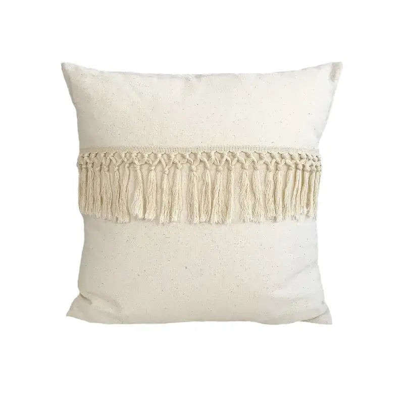 Boho style beige linen cushion cover with cream woven macrame fringe band and tassels for living room decor by decorbites