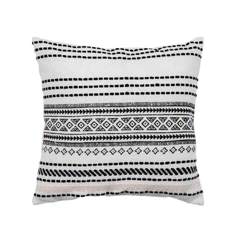 White cotton boho style pillow cover with black geometric embroidery for cream and mustard living room decorbites boho style