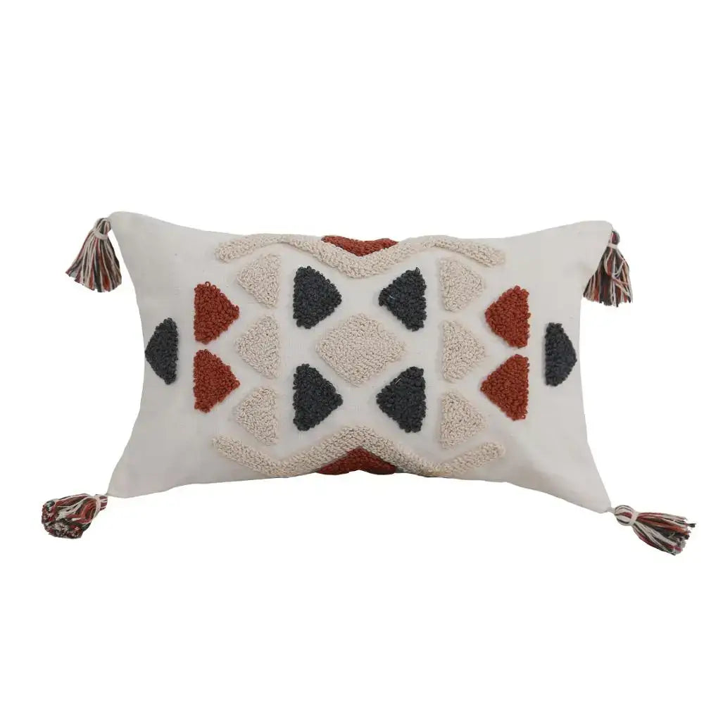 Cream rectangular pillow cover with rust and charcoal geometric pattern and multicolored tassels decorbites boho style embroidered