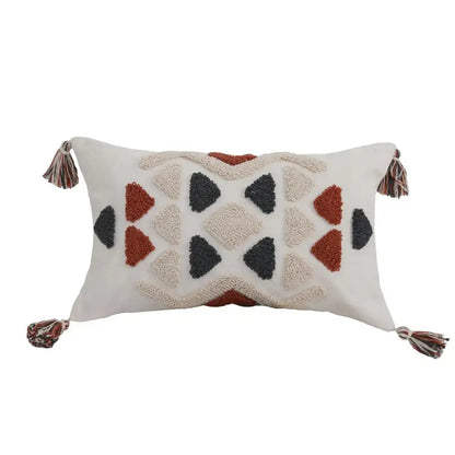 Cream rectangular pillow cover with rust and charcoal geometric pattern and multicolored tassels decorbites boho style embroidered