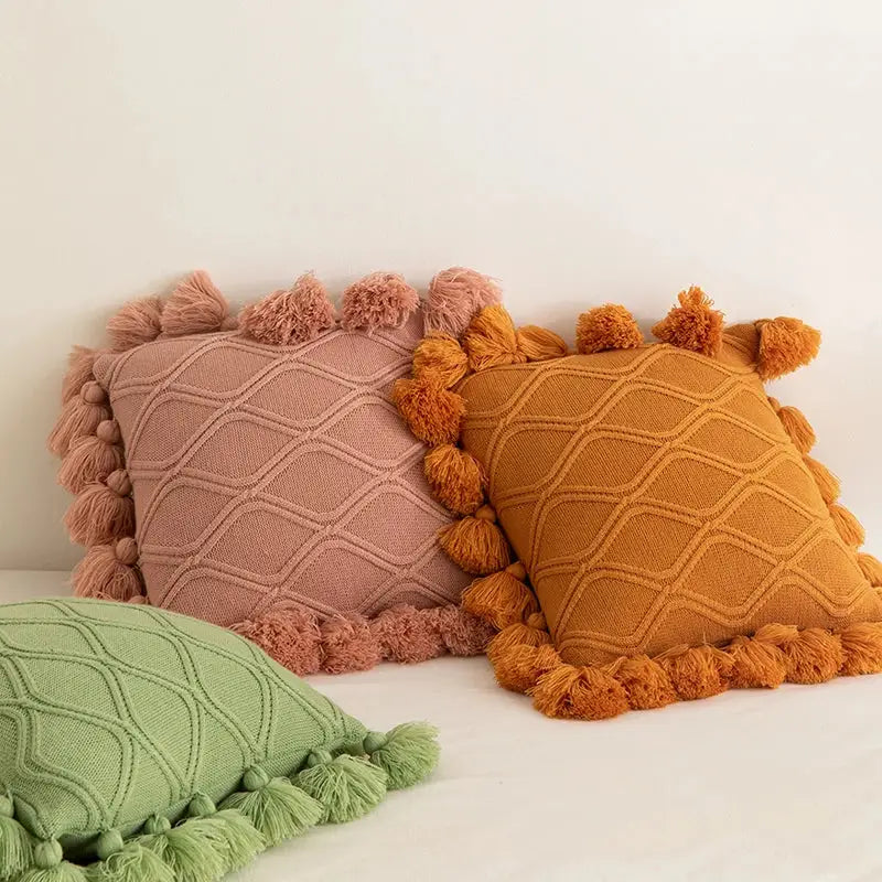 Boho style ivory cushion cover with dusty rose and mustard yellow pom-pom trim for decorbites boho style decor