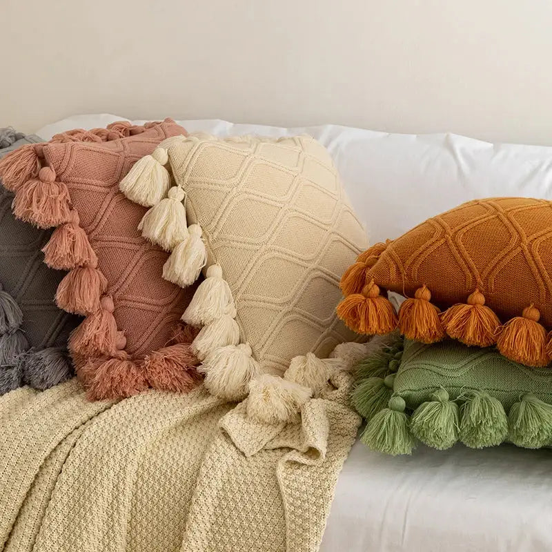Cozy textured boho style ivory cushion cover with pastel tones and fluffy tassels for living room decorbites decor