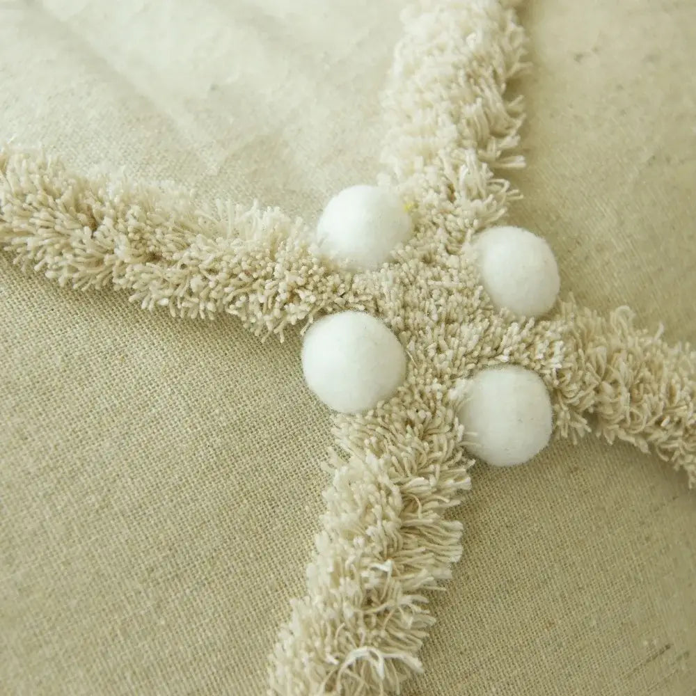 Bohobites boho style ivory cushion cover with cream textured fringe trim and four white pom poms for living room decor