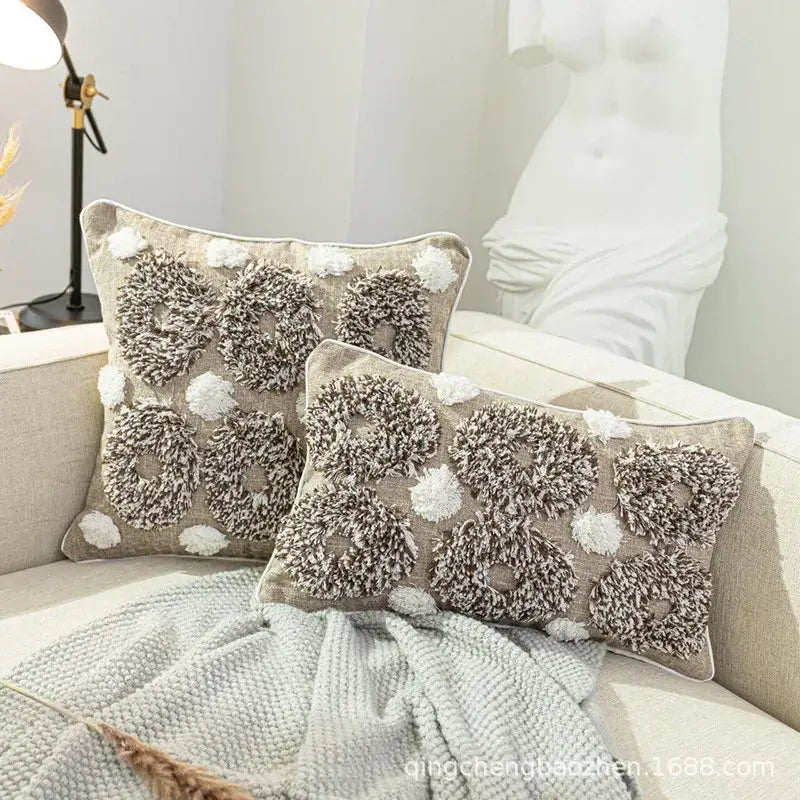 Beige cushion cover with boho style tufted fluffy circular patterns in brown and white by decorbites for living room decor
