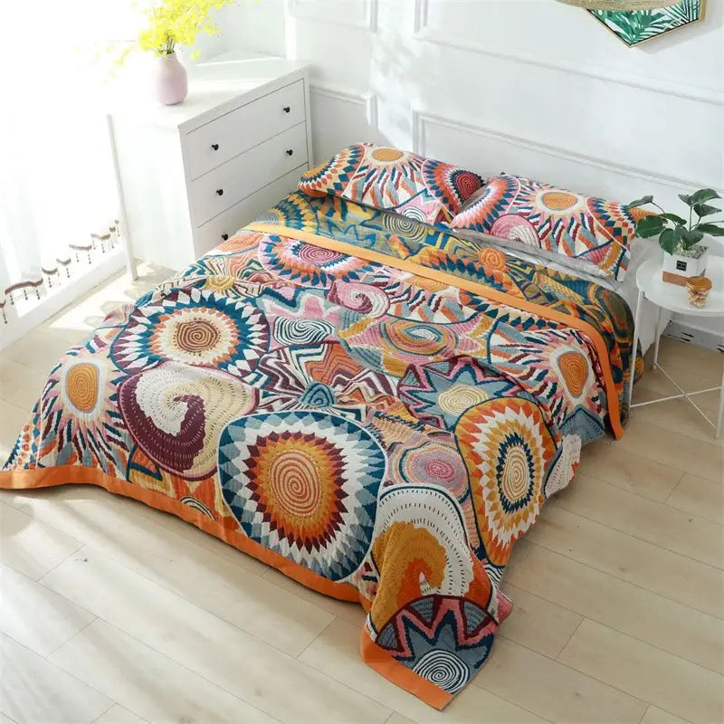Vibrant boho teal floral cotton cover throw blanket set with bold geometric and spiral patterns in orange blue pink and beige