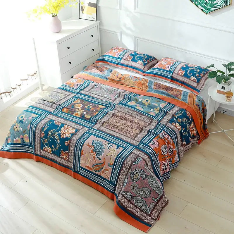 Vibrant boho teal floral cotton cover throw blanket with intricate patchwork and paisley patterns for bedroom use