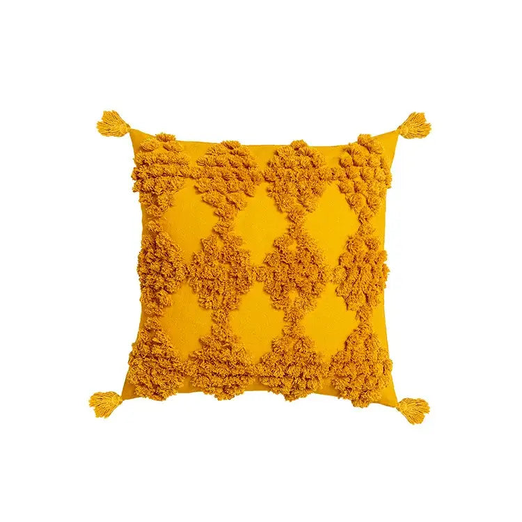 Vibrant mustard-yellow pillow cover with fluffy pom-pom patterns and tassels for decorbites boho tufted beige decor