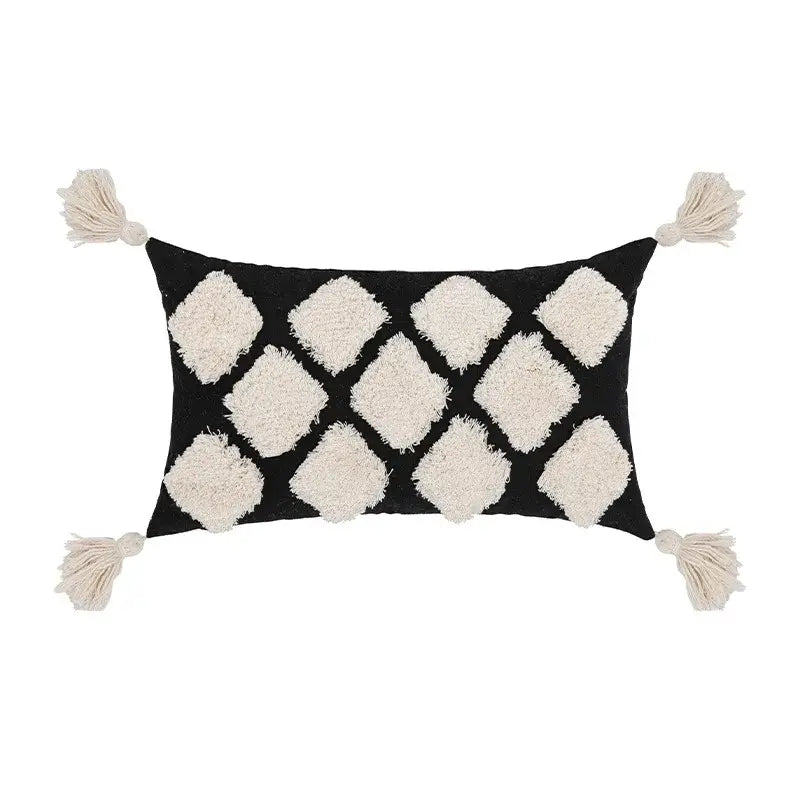 Black rectangular pillow cover with cream diamond-shaped tassels and corner accents for decorbites boho tufted beige decor