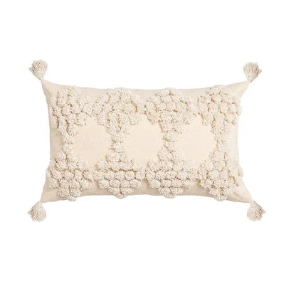 Cream-colored boho tufted beige pillow cover with fluffy pom-pom clusters and tassels for living room decorbites decor