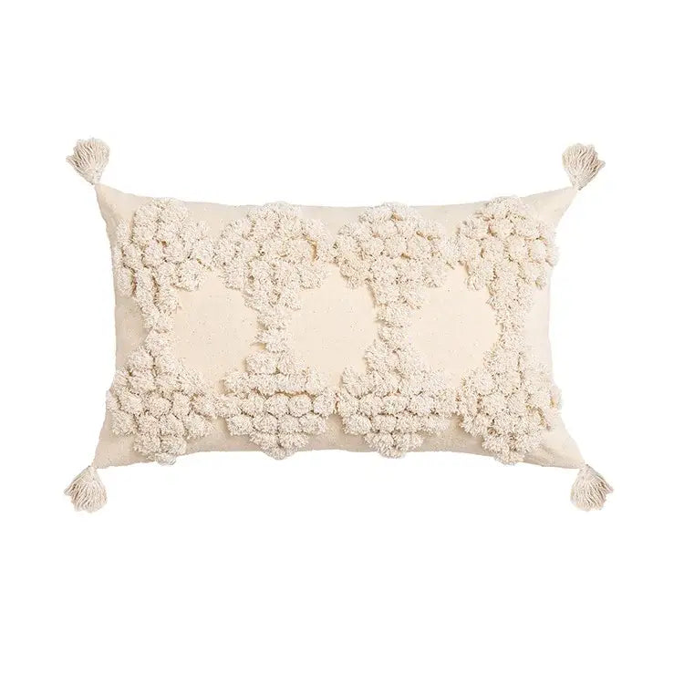 Cream-colored boho tufted beige pillow cover with fluffy pom-pom clusters and tassels for living room decorbites decor