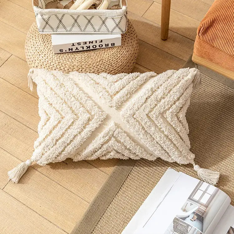 Cream-colored textured boho tufted beige pillow cover with geometric pattern and tassels for living room decorbites decor