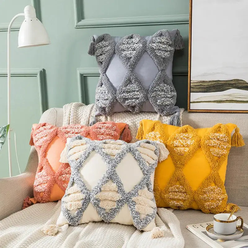 Gray and cream textured boho tufted embroidered cushion cover with tassel accents for living room decorbites pillow