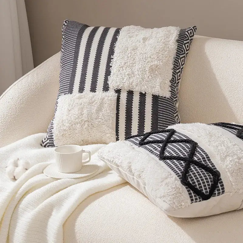 Bohob tufted fringed black and white throw pillow with textured knit and fluffy faux fur for living room decorbites