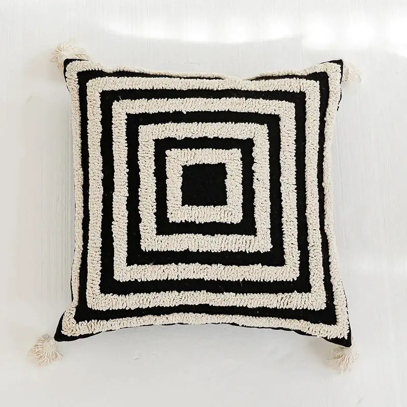 Black and cream boho tufted pillow cover with textured concentric geometric pattern and tassels for living room decorbites boho tufted pillow