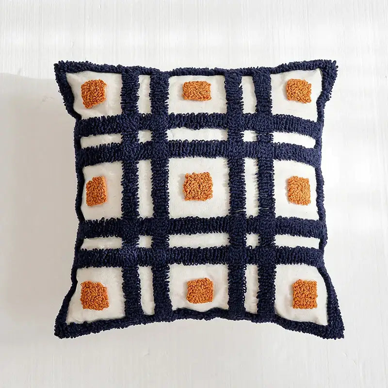 Navy and cream textured throw pillow cover with burnt orange tufted squares boho tufted pillow decorbites style