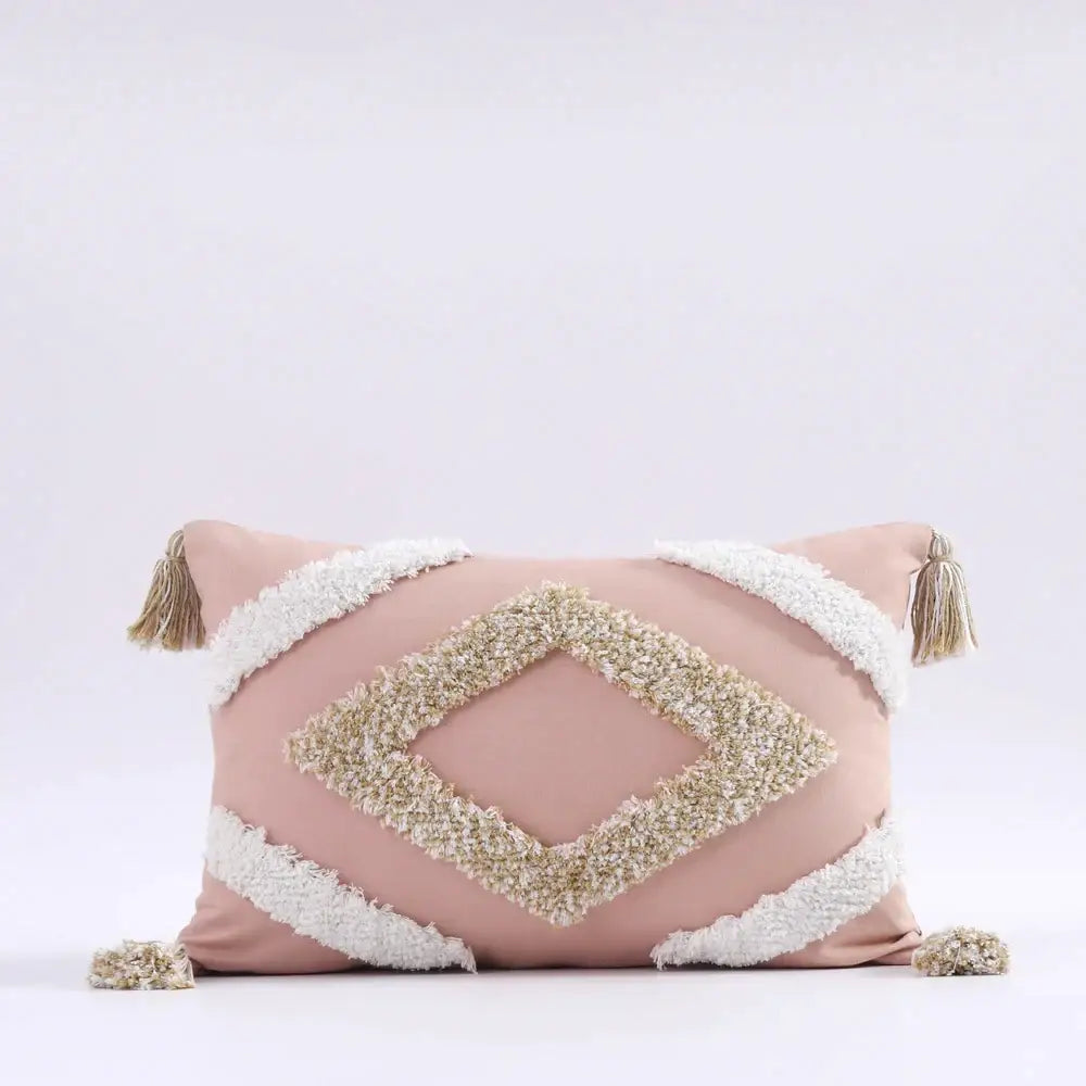A blush pink boho tufted tassel cushion cover with cream diamond pattern and tassels for living room decorbites decor