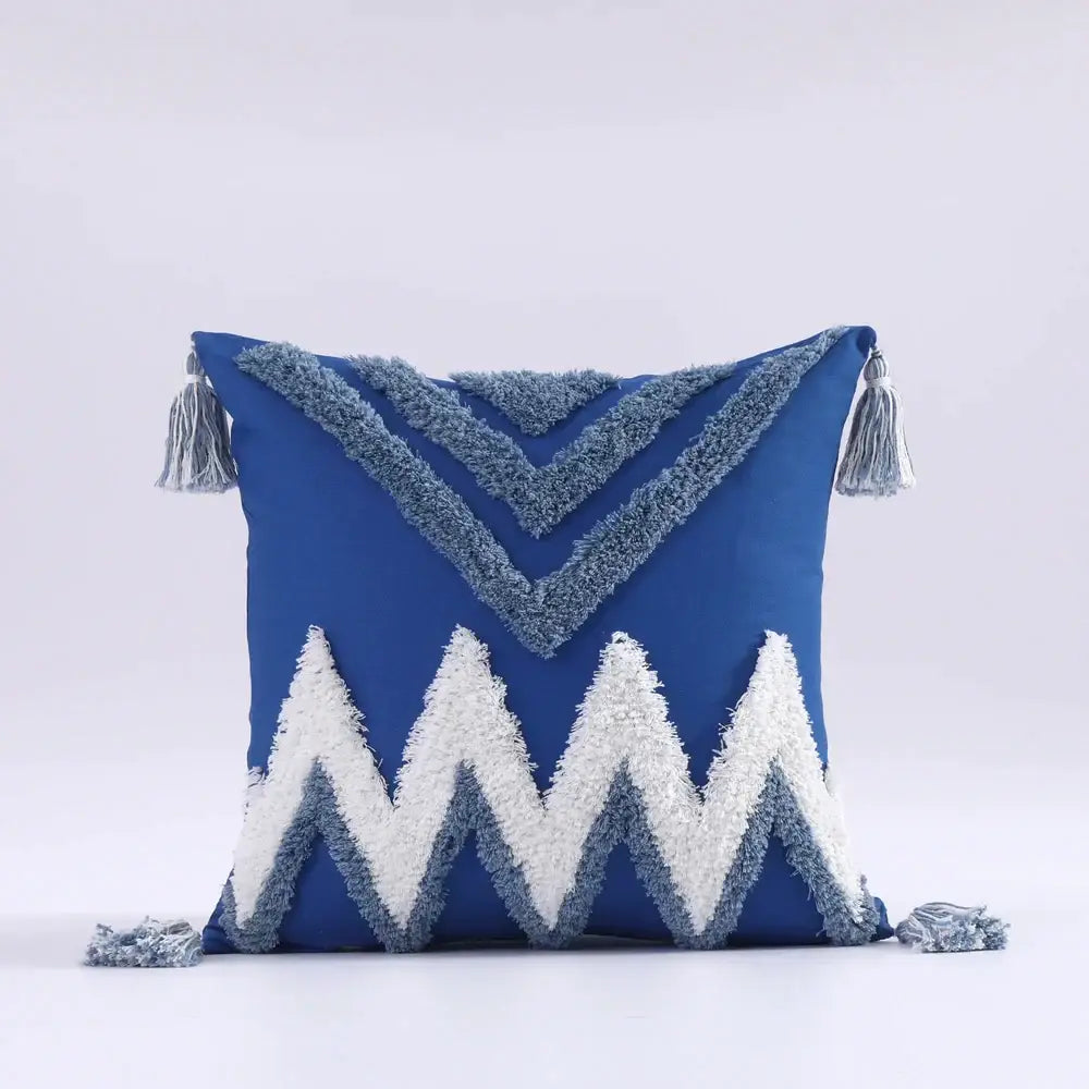 Blue boho tufted tassel cushion cover with white and gray zigzag patterned tassels for decorbites living room decor