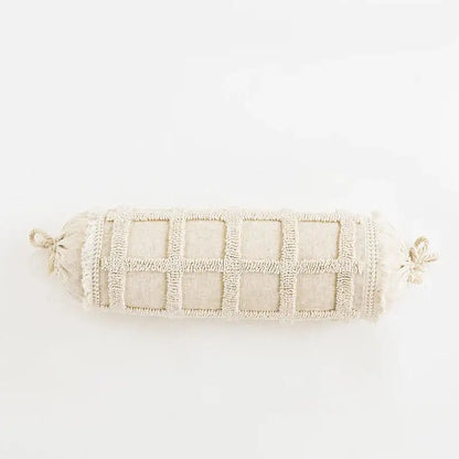 Beige cylindrical cushion cover with textured grid pattern and tied ends for decorbites boho tufted tassel decor