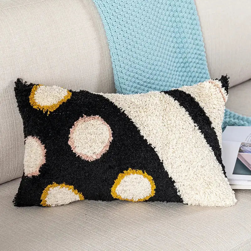 Boho white and black abstract eye pillow cover with black and cream texture and pink yellow circular accents for decorbites black abstract decor