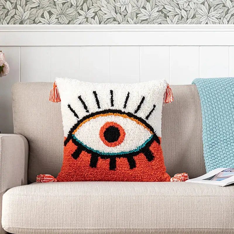 Boho white and black abstract eye pillow cover with coral tassels and teal iris outline for living room decorbites black abstract decor