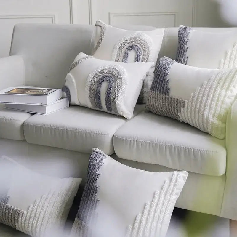 Boho white and gray tufted cushion cover with textured gray rainbow embroidery and ribbed fabric decorbites boho loop pillowcase