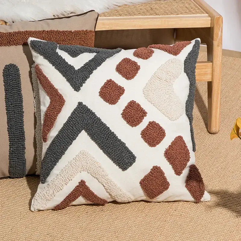 A cozy cream cushion cover with textured geometric pattern in brown and gray for decorbites boho loop pillowcase
