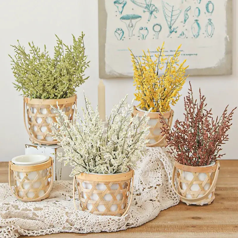 Light beige woven bamboo boho wicker baskets with handles holding decorbites forever dancing grass flowers