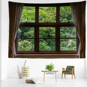Boho window jungle scenery wall tapestry featuring a brown wooden window with dark curtains and lush green trees decorbites jungle scenery