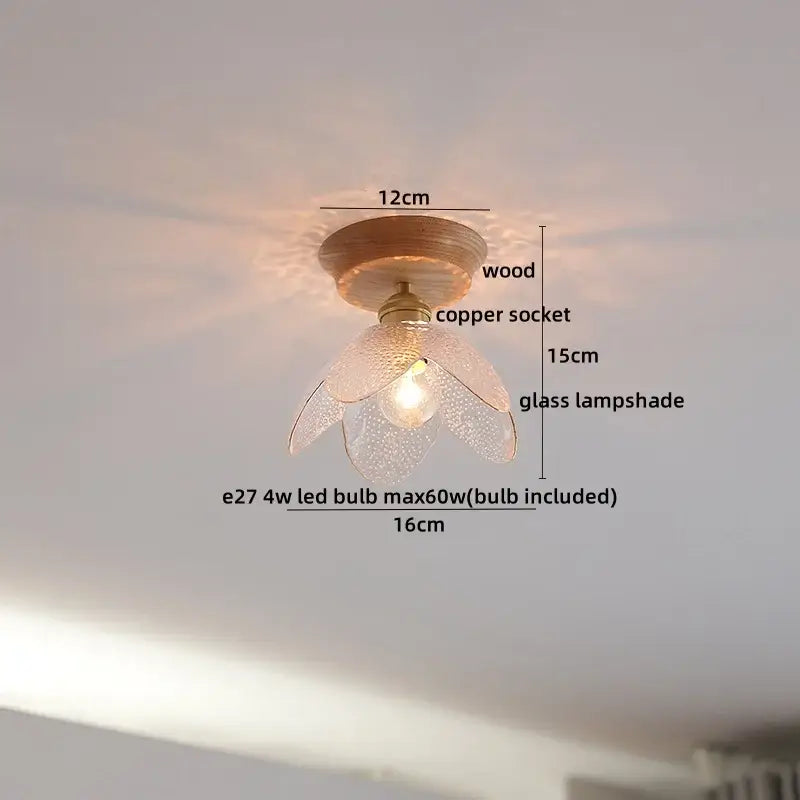 A delicate flower-shaped glass lampshade with a textured finish on a copper wood led ceiling light for bedroom decorbites decor
