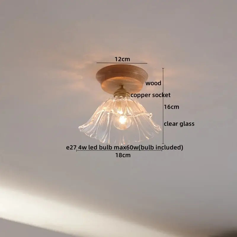 A delicate clear glass pendant light with wooden base copper socket fluted design for boho decorbites copper wood use