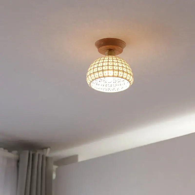 Boho woven rattan wood led ceiling light with warm-toned spherical shade and wooden base for bedroom decorbites copper wood style