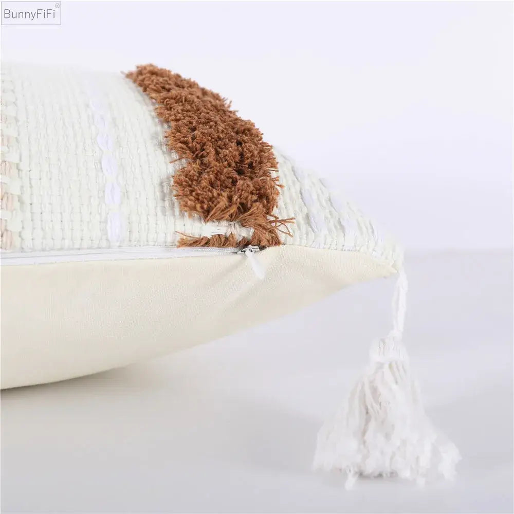 Cream-colored boho woven tassel pillow case with textured woven pattern and brown fringed strip for living room decorbites decor