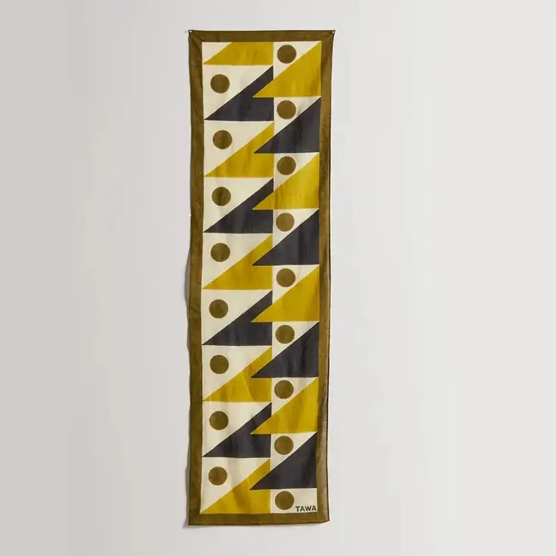 A boho yellow and black celestial geometry tapestry bedroom silk scarf with bold geometric pattern and brown border