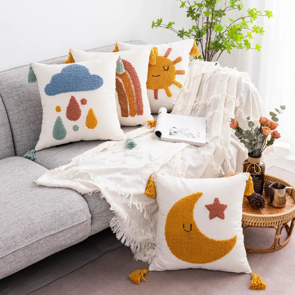 White throw pillows with colorful embroidered celestial designs and tassels boho yellow rainbow cushion cover decorbites boho yellow