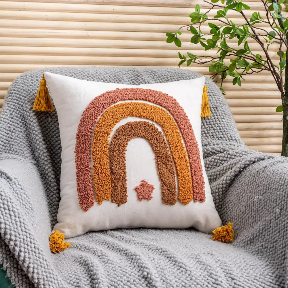 A cozy white cushion cover with a textured boho yellow rainbow design and tassels for living room decorbites boho yellow