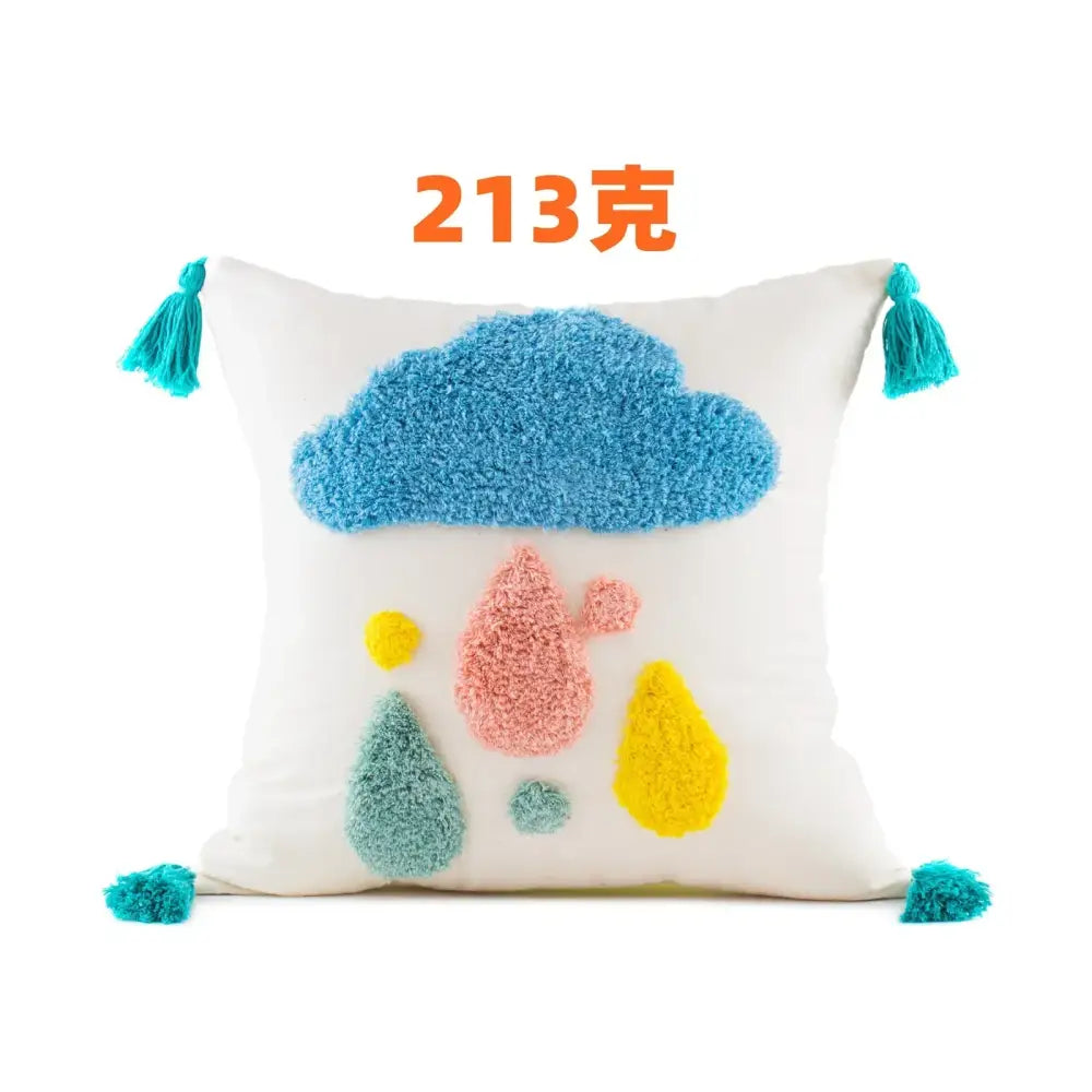Boho yellow rainbow cushion cover with white base fluffy blue cloud colorful pom-poms and turquoise tassels decorbites boho yellow