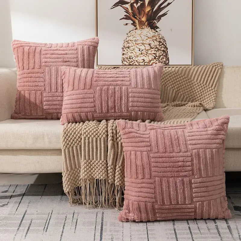 Soft pink textured plush throw pillow covers with a woven ribbed pattern for boho living room decor