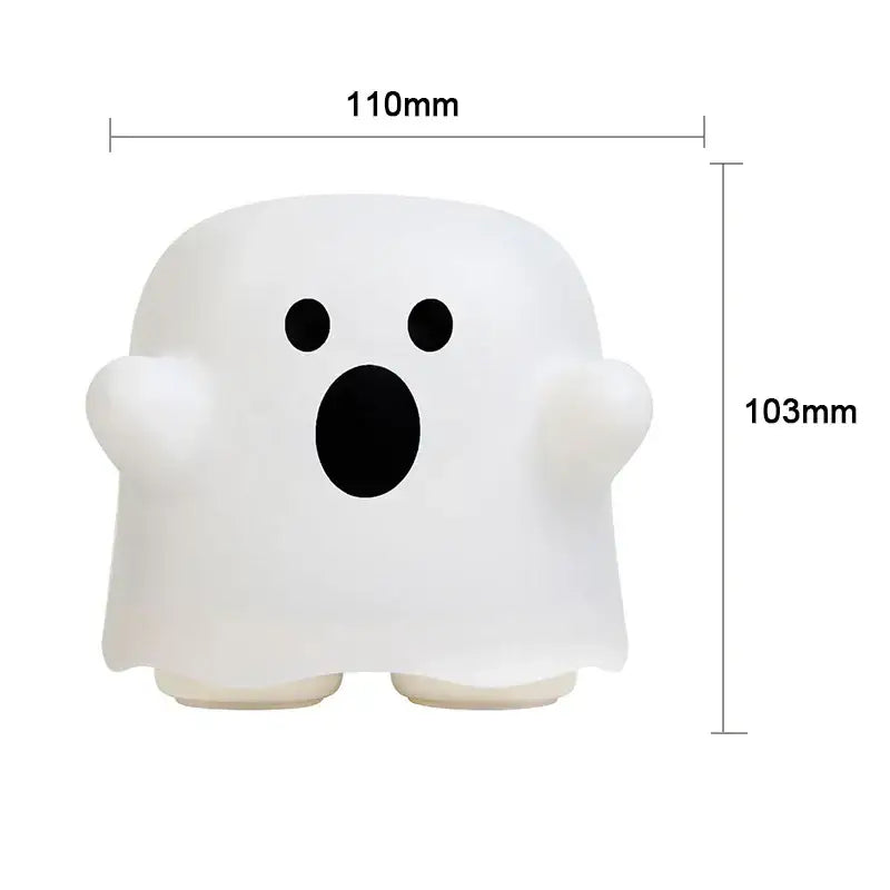 A soft white translucent boo ghost silicone lamp with black eyes and mouth used as a bedroom led night light decorbites boo ghost