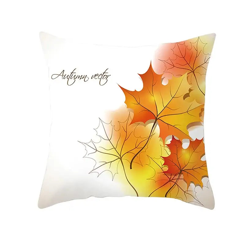 White throw pillow with vibrant autumn maple leaves design in orange yellow and red for living room decor