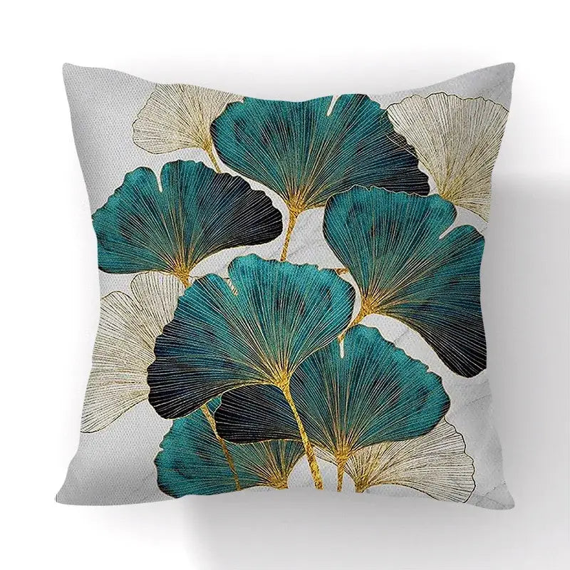 Square cushion cover featuring modern teal black and gold big leaves on light gray textured fabric for living room decor