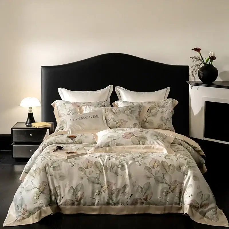 Elegant cream-colored egyptian cotton print bedding set with botanical leaf pattern and premonde branding on pillowcase