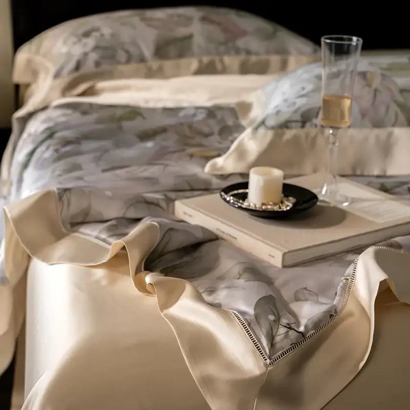 Beige satin quilt set with subtle leaf pattern and delicate stitched edge featuring decorbites eucalyptus fiber flowers