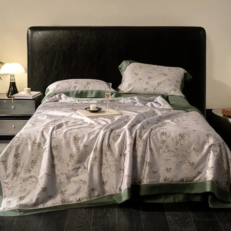 Botanical ivory eucalyptus fiber quilt set with light gray satin duvet cover and eucalyptus fiber flowers decorbites pattern