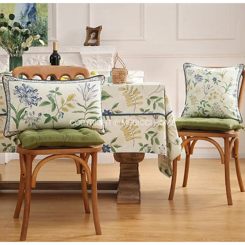 Beige tablecloth with delicate botanical leaf watercolor print in blue green and yellow for elegant bedroom decor