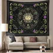 Black floral tapestry with golden sun face green vines purple flowers and celestial moons for decorbites botanical moon phase decor